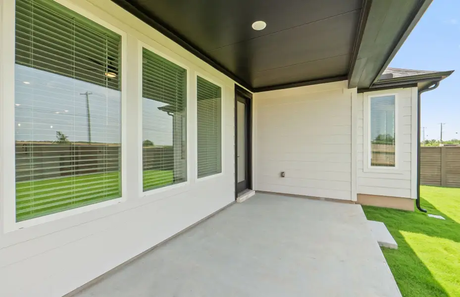 Exterior details and patio area of a home in Kuempel Farms, Pflugerville (Image 29).