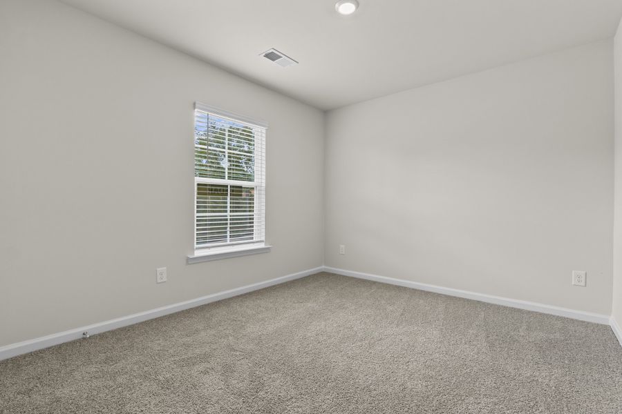 Representative unfurnished interior of a home built from the Cedar B by McGuinn Homes in Willow Lake, Blythewood (Image 28).