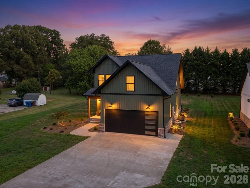 Front exterior of a new home in , Taylorsville, NC, highlighting curb appeal (Image 27). Front exterior of a new home in , Taylorsville, NC, highlighting curb appeal (Image 27).