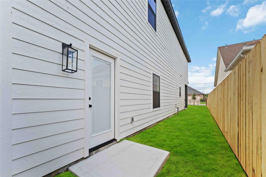 Exterior details and patio area of a home in , Houston (Image 2). Exterior details and patio area of a home in , Houston (Image 2).