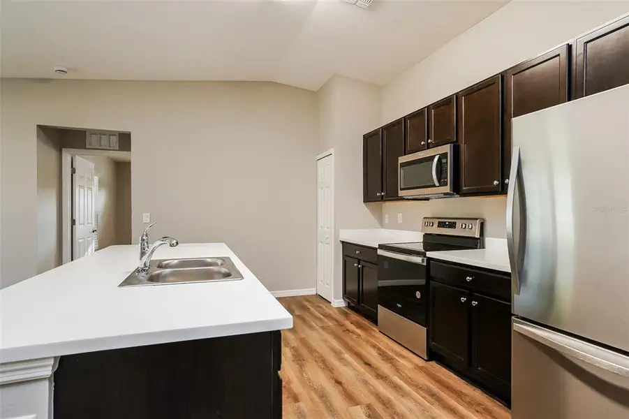 Furnished interior view inside a new home in , North Port (Image 4).