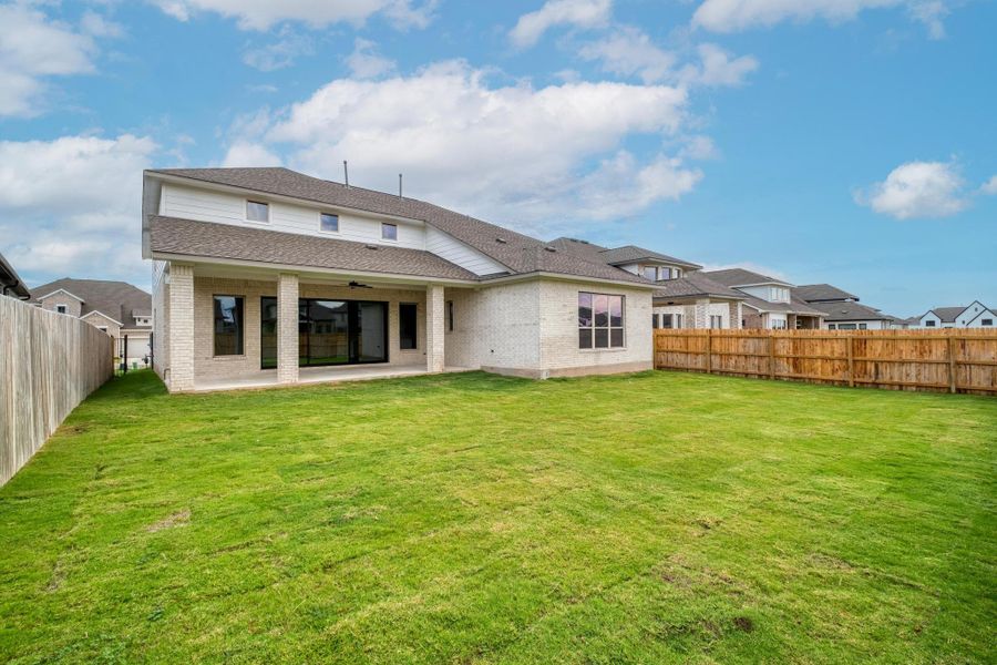 Exterior details and patio area of a home in Santa Rita Ranch - 60', Liberty Hill (Image 3). Exterior details and patio area of a home in Santa Rita Ranch - 60', Liberty Hill (Image 3).