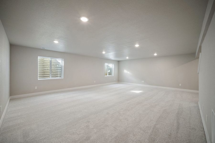 Spacious, unfurnished interior of a new home in The Glen, Colorado Springs (Image 30).