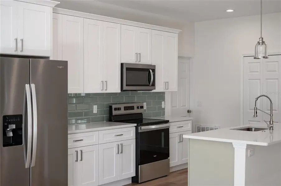 Furnished interior view inside a new home in , Osteen (Image 10).