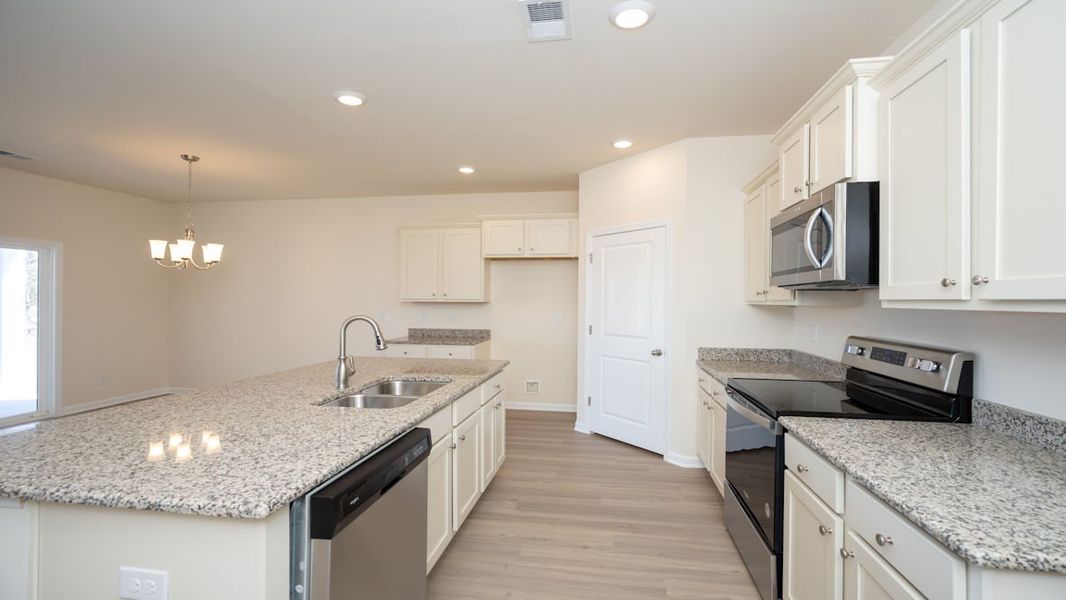 Representative furnished interior of a home built from the CALI by D.R. Horton in Island Green, Myrtle Beach (Image 7).