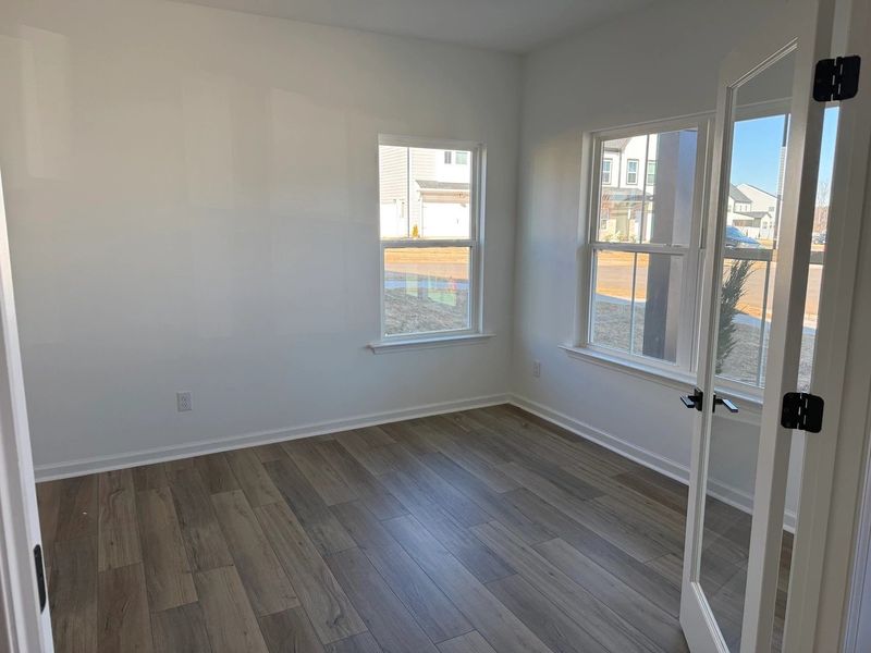 Study featuring the AW Collection® Rosemary - A quiet retreat with deep hues and light wood.