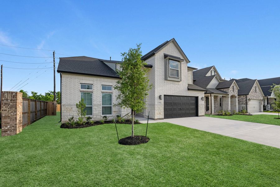 Front exterior of a new home in Morton Creek Ranch, Katy, TX, highlighting curb appeal (Image 22). Front exterior of a new home in Morton Creek Ranch, Katy, TX, highlighting curb appeal (Image 22).