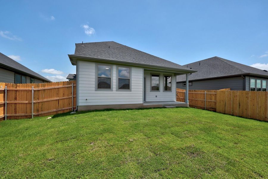 Exterior details and patio area of a home in Prairie Winds, Hutto (Image 19).