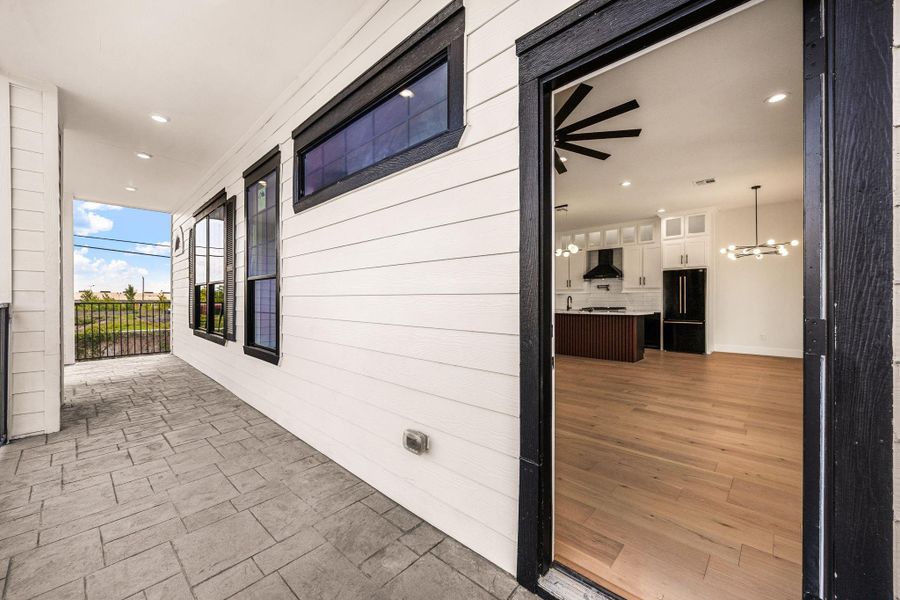 An expansive balcony featuring stylish flooring, LED lighting, and a beautiful open view, perfect for relaxing or entertaining.