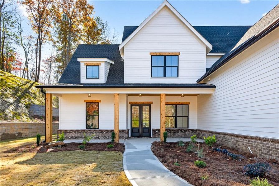 Front exterior of a new home in , Canton, GA, highlighting curb appeal (Image 18). Front exterior of a new home in , Canton, GA, highlighting curb appeal (Image 18).