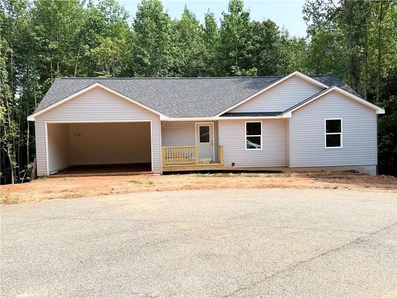 Front exterior of a new home in , Mount Airy, GA, highlighting curb appeal (Image 2). Front exterior of a new home in , Mount Airy, GA, highlighting curb appeal (Image 2).