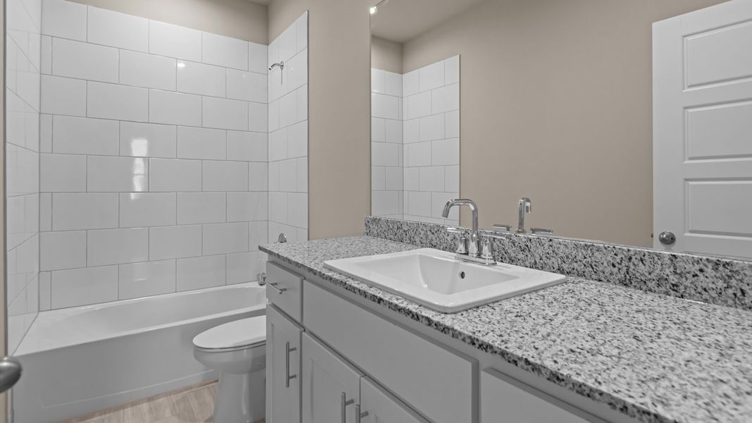 Representative furnished interior of a home built from the Tupelo by D.R. Horton in Legacy South, Midland (Image 8). Representative furnished interior of a home built from the Tupelo by D.R. Horton in Legacy South, Midland (Image 8).