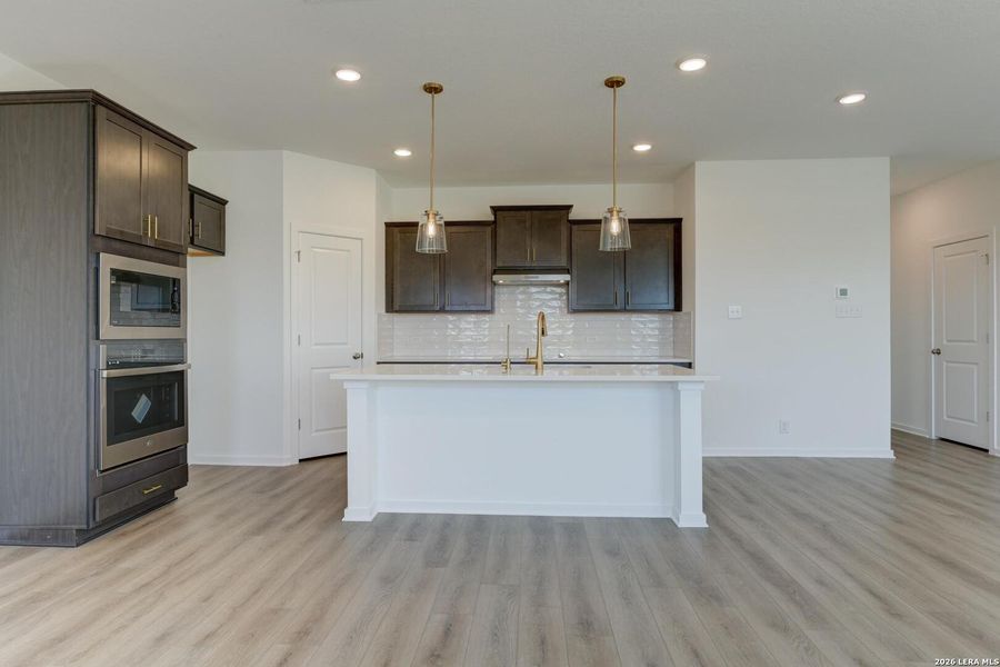Furnished interior view inside a new home in Hennersby Hollow, San Antonio (Image 12).
