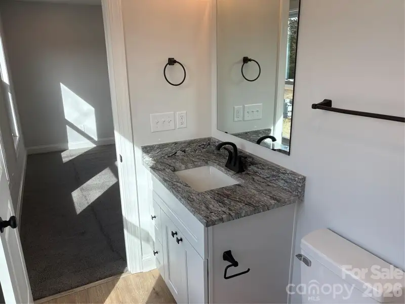 Furnished interior view inside a new home in , Statesville (Image 3).
