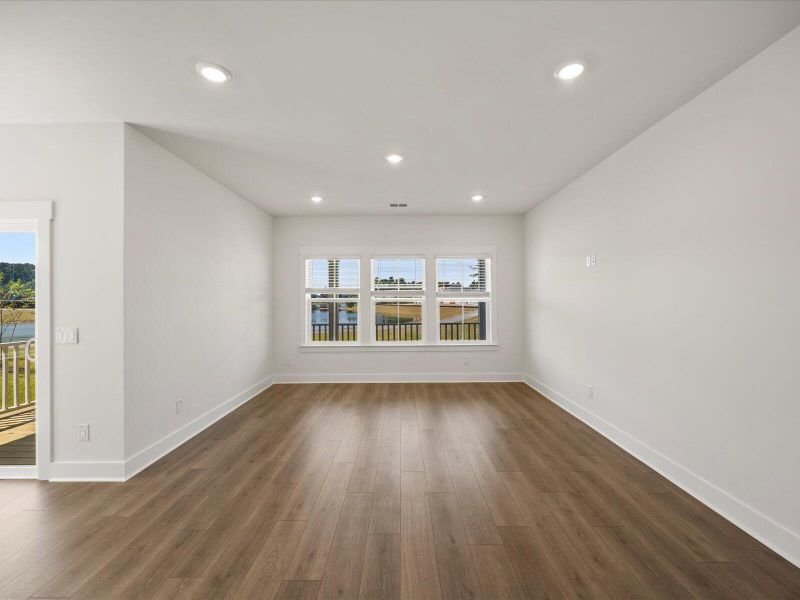 Spacious, unfurnished interior of a new home in The Coves at Lakes of Cane Bay, Summerville (Image 19). Spacious, unfurnished interior of a new home in The Coves at Lakes of Cane Bay, Summerville (Image 19).
