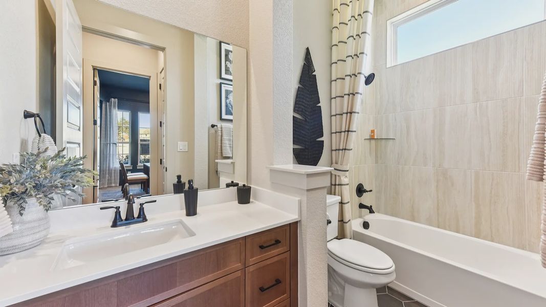 Representative furnished interior of a home built from the Peyton by Chesmar Homes in The Grove at Blackhawk, Pflugerville (Image 10).