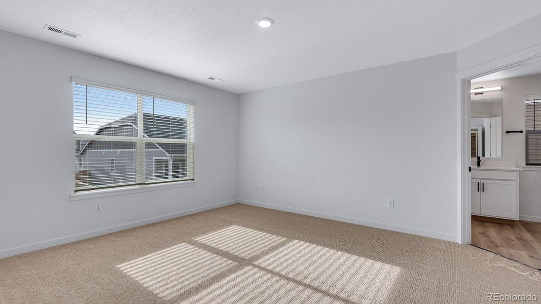 Spacious, unfurnished interior of a new home in Trails at Crowfoot, Parker (Image 25).