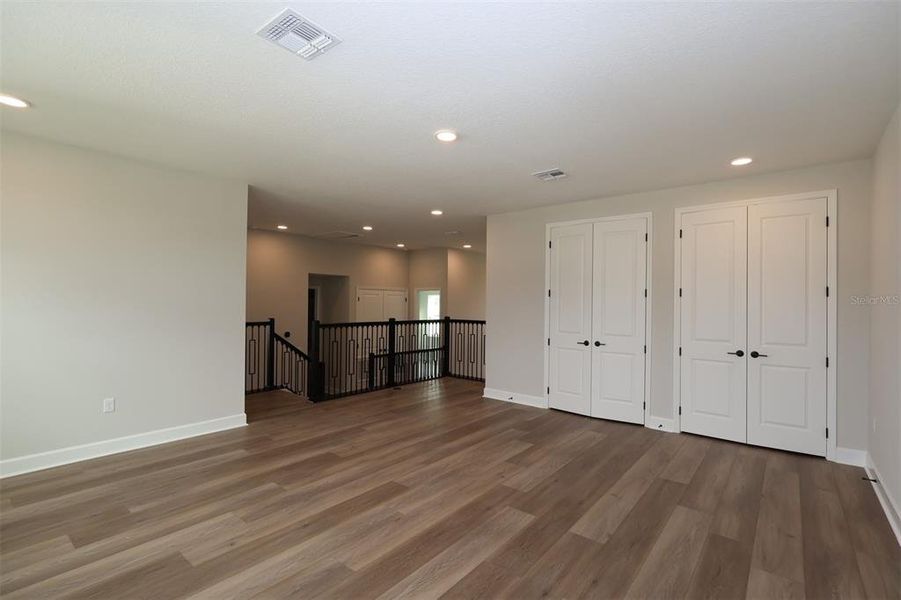 Spacious, unfurnished interior of a new home in Solace at Corner Lake, Orlando (Image 24).