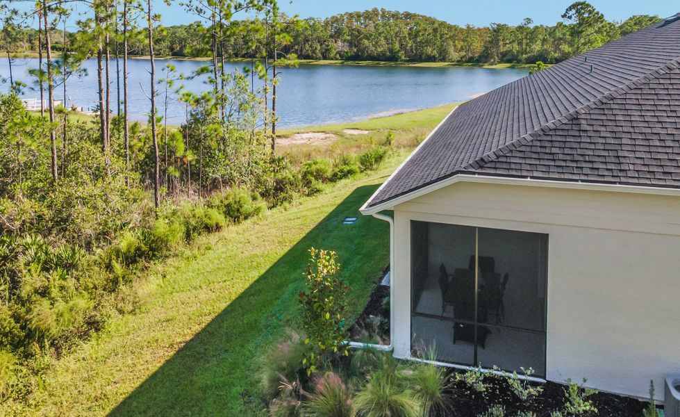 Exterior details and patio area of a home in Woodhaven, Port Orange (Image 2). Exterior details and patio area of a home in Woodhaven, Port Orange (Image 2).