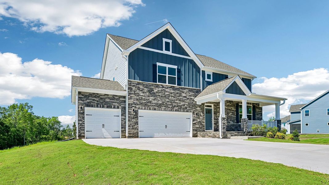 Representative exterior photo of a completed home built from the Wylie by D.R. Horton in The Manors at Winston Pointe, Clayton, NC (Image 21). Representative exterior photo of a completed home built from the Wylie by D.R. Horton in The Manors at Winston Pointe, Clayton, NC (Image 21).