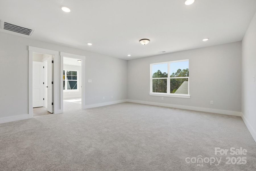 Spacious, unfurnished interior of a new home in Carrington, Stanley (Image 40).