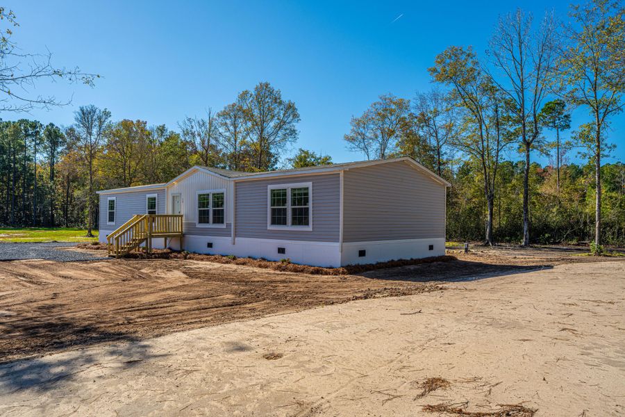 Exterior details and patio area of a home in , Pinopolis (Image 23).