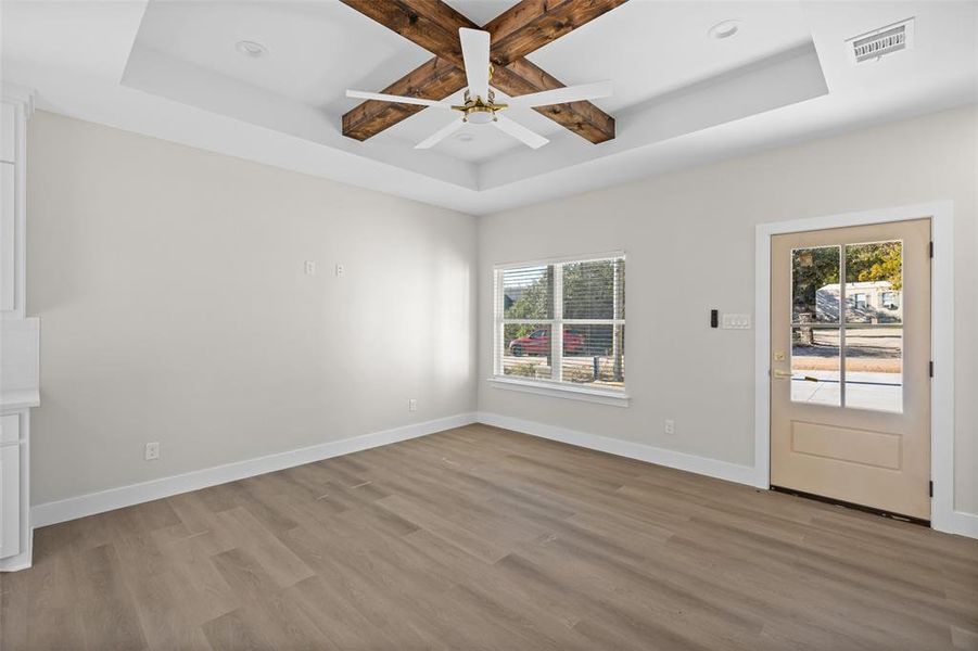 Large and open living room with fan