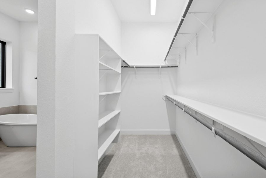Furnished interior view inside a new home in Riceland - Enclave Row Collection, Mont Belvieu (Image 11).