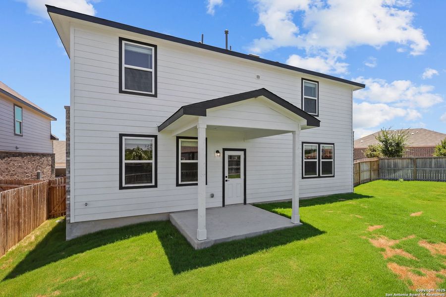 Front exterior of a new home in Comanche Ridge, San Antonio, TX, highlighting curb appeal (Image 71). Front exterior of a new home in Comanche Ridge, San Antonio, TX, highlighting curb appeal (Image 71).