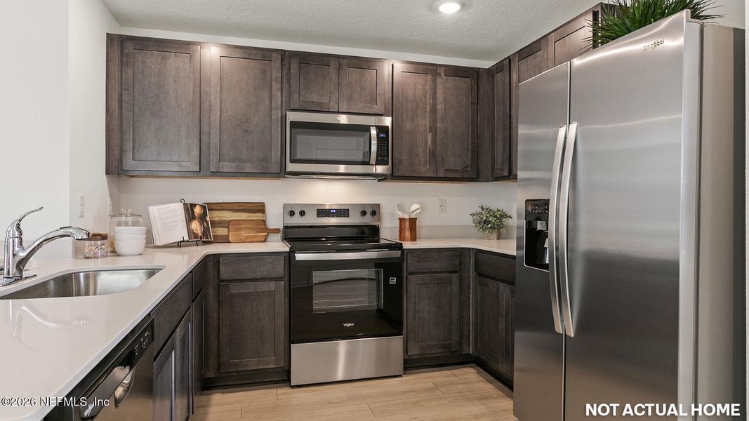 Furnished interior view inside a new home in Rookery, Green Cove Springs (Image 6).