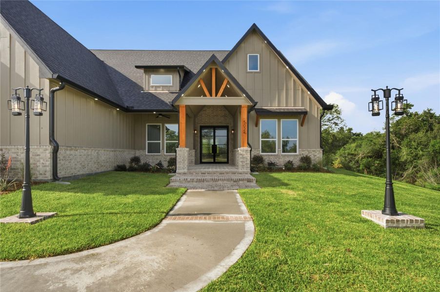 Front exterior of a new home in , Baytown, TX, highlighting curb appeal (Image 24). Front exterior of a new home in , Baytown, TX, highlighting curb appeal (Image 24).