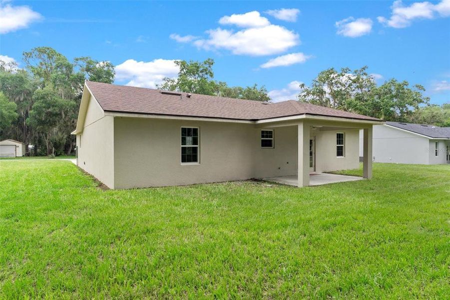 Back Exterior and Backyard Area