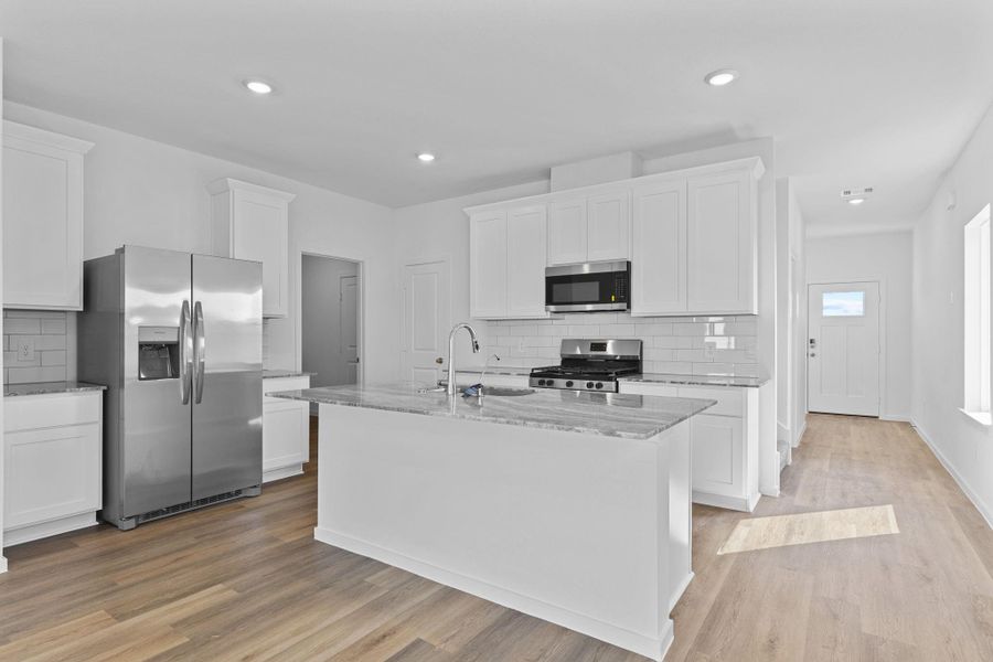 Furnished interior view inside a new home in Watermark, Alvin (Image 9). Furnished interior view inside a new home in Watermark, Alvin (Image 9).