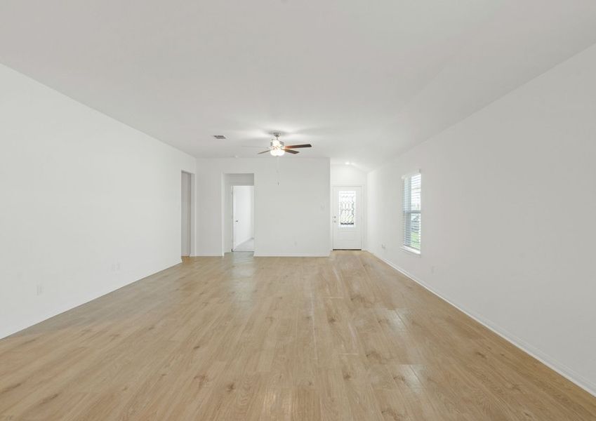 Spacious family room with vinyl flooring Spacious family room with vinyl flooring