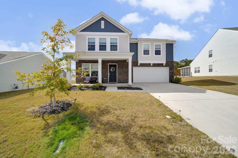 Front exterior of a new home in , Edgemoor, SC, highlighting curb appeal (Image 23).
