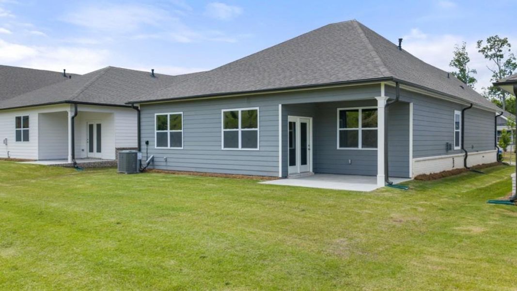 Exterior details and patio area of a home in Hamptons at Riverwood North, Dallas (Image 53).