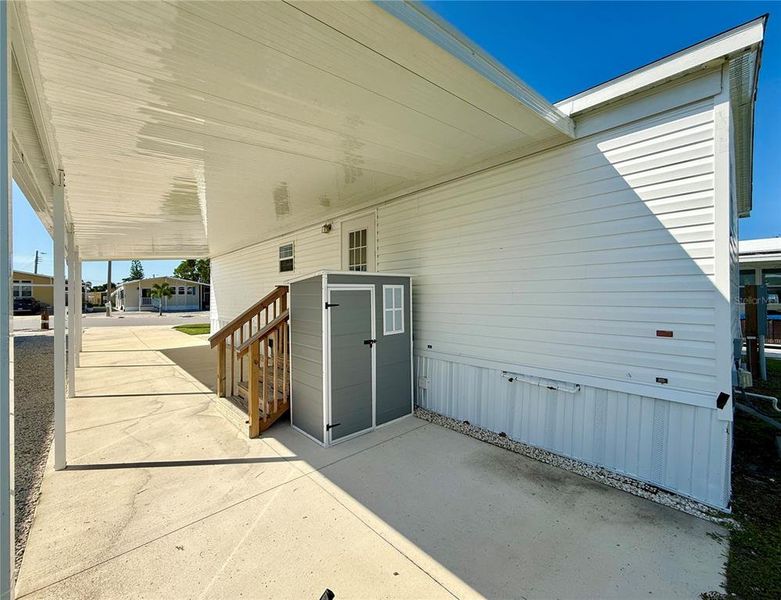 Front exterior of a new home in , Sarasota, FL, highlighting curb appeal (Image 23).