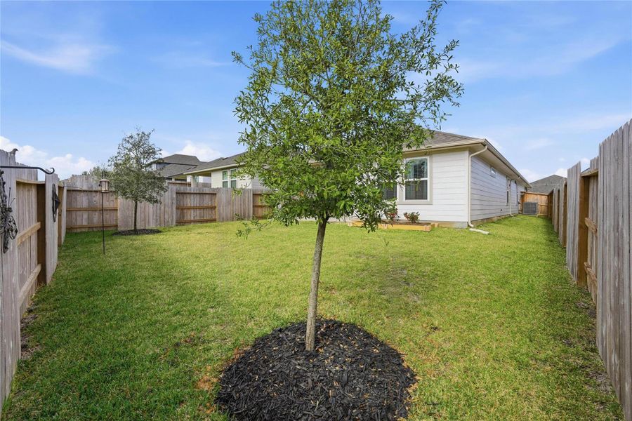 Exterior details and patio area of a home in Montgomery Oaks - Premier, Conroe (Image 28).