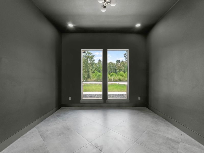 Formal Office is moody and a great  place to set up your workspace! Could be used as a playroom, wineroom, and so much more!