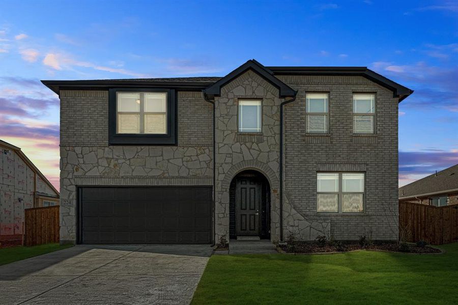 Front exterior of a new home in East Oak Creek Elements, Commerce, TX, highlighting curb appeal (Image 1).