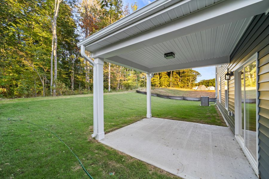 Exterior details and patio area of a home in Chandler Ridge, McLeansville (Image 3).