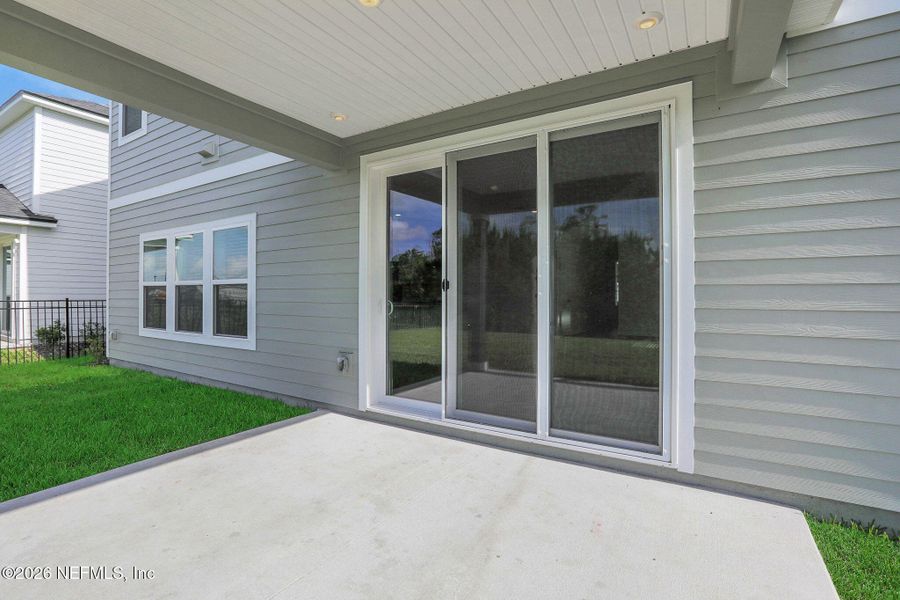 Exterior details and patio area of a home in Hyland Trail, Green Cove Springs (Image 35).