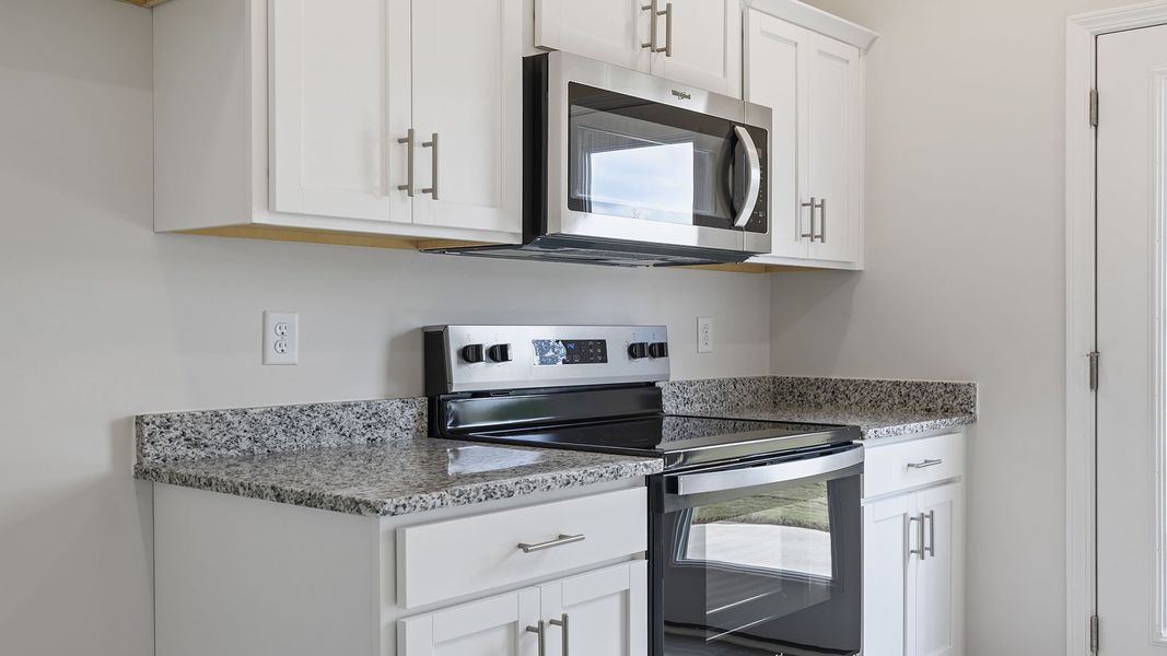 Furnished interior view inside a new home in Tanglewood Townes, Greenville (Image 7).