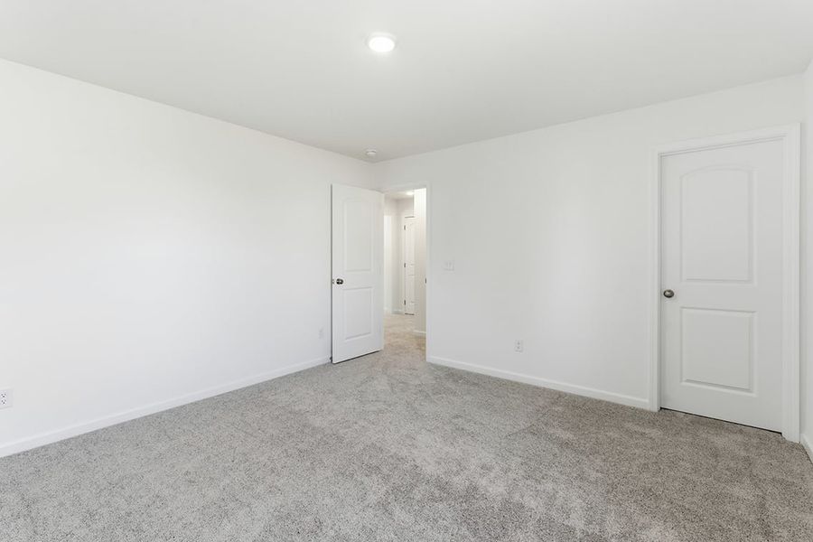 A room with white doors.