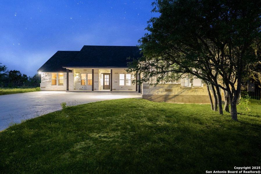 Front exterior of a new home in , Kerrville, TX, highlighting curb appeal (Image 2).