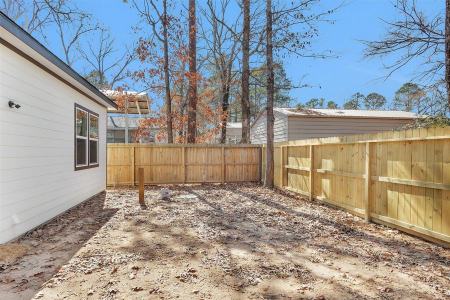 Exterior details and patio area of a home in , Point Blank (Image 25). Exterior details and patio area of a home in , Point Blank (Image 25).