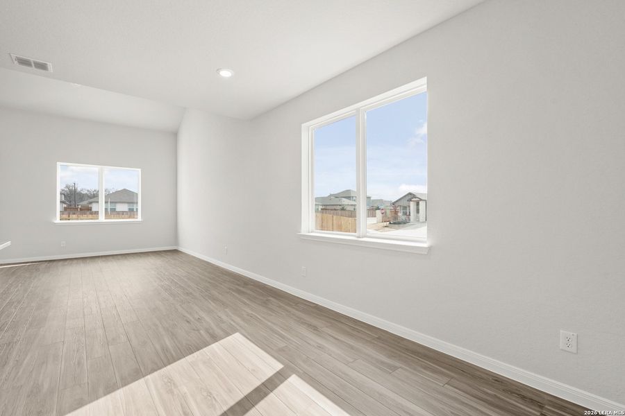 Spacious, unfurnished interior of a new home in Abbott Place, St. Hedwig (Image 25).