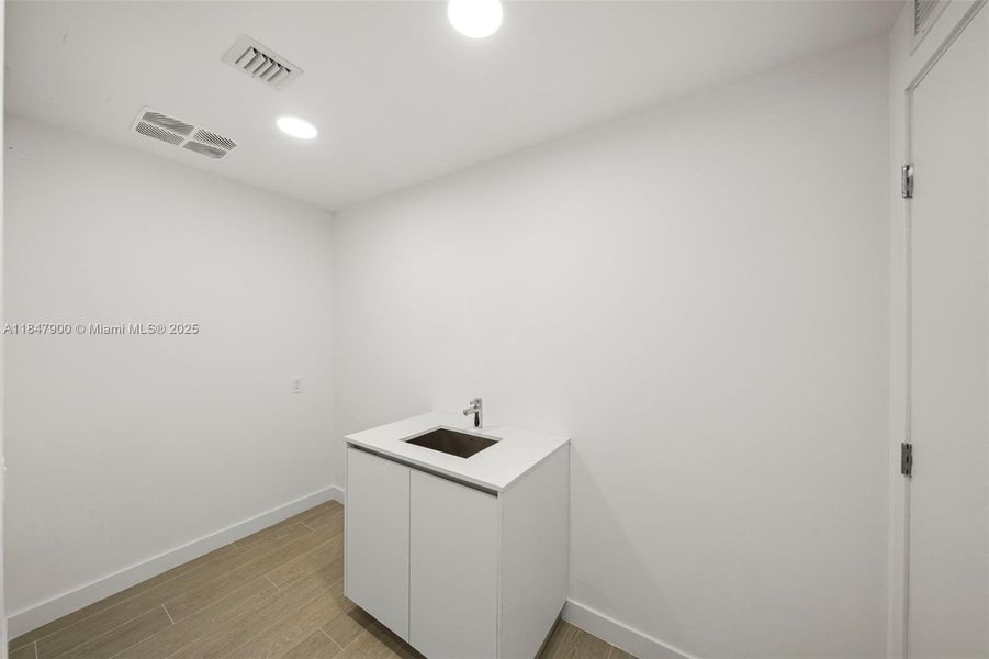 Furnished interior view inside a new home in , Miami Beach (Image 10). Furnished interior view inside a new home in , Miami Beach (Image 10).