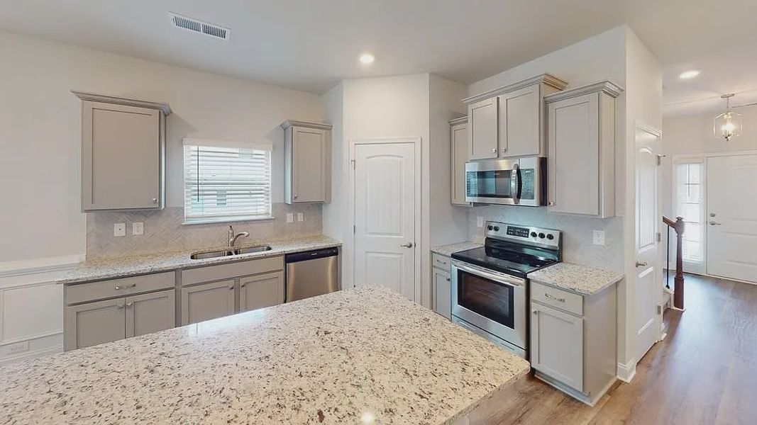 Furnished interior view inside a new home in Mirror Lake at South Harbour, Villa Rica (Image 3).
