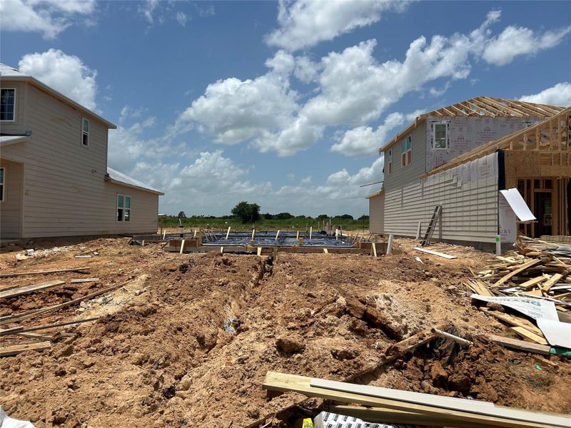 Front exterior of a new home in Lonestar Collection at Paloma at Sanford Farms, Waller, TX, highlighting curb appeal (Image 11). Front exterior of a new home in Lonestar Collection at Paloma at Sanford Farms, Waller, TX, highlighting curb appeal (Image 11).